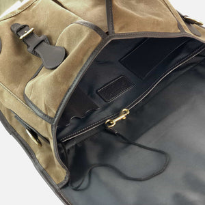 Interior pockets view of Anglers Bag classic cross body messenger tan wax cotton with dark brown stout leather